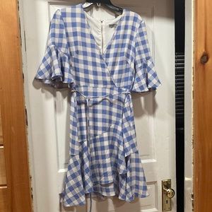 Blue and white plaid dress with bow.